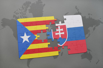 puzzle with the national flag of catalonia and slovakia on a world map background.