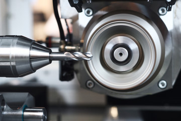sharpening metalworking. Industrial CNC metal machining by vertical mill