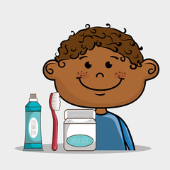 Smiling cartoon boy with dental care implements