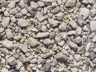 Abstract pebble stones background texture macro, selective focus