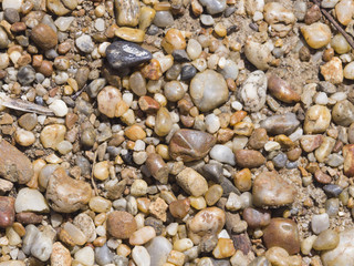 Abstract pebble stones background texture macro, selective focus