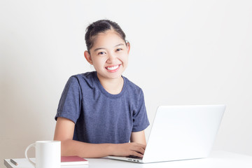 Happy Young Beautiful Woman Using Laptop