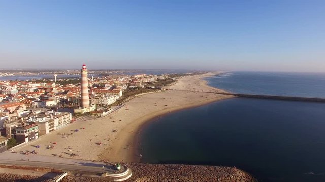 Lighthouse on the beach Praia Velha, Barra, Aveiro, Portugal aerial view