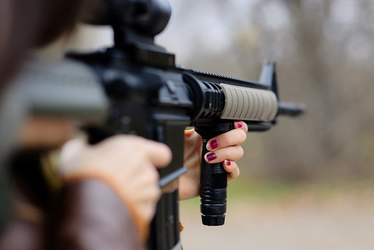 Girl With Automatic Weapons, Large