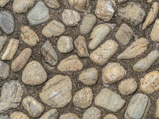 Stones in concrete background