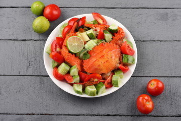 Overhead view-summer seafood salad on a gray background.