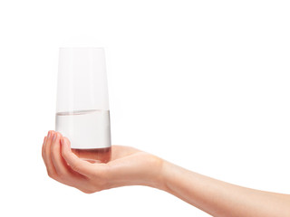 Female hand holding clean drinking glass with water