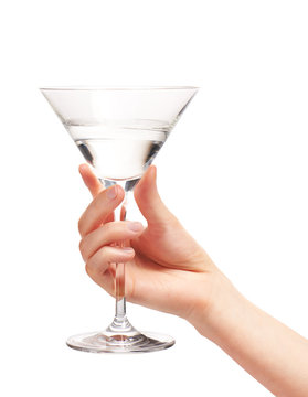 Female Hand Holding Clean Martini Glass With Water