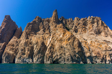 Fototapeta na wymiar rocky shore sea cliffs in Crimea Karadag