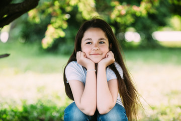 littel girl posing for the camera