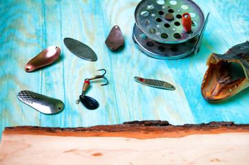 The composition of fishing lures, pike and old-fashioned reel