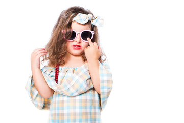 Fashion portrait of girl child. Sunglasses.