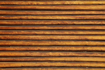 Natural background pattern of a log wall