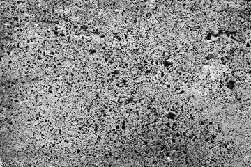 Wall fragment with scratches and cracks