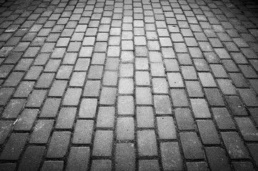 Gray urban cobble road background