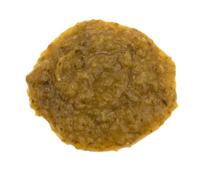 Blob of culantro cooking sauce on a white background