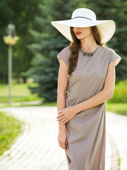 Beautiful young woman in a summer dress.