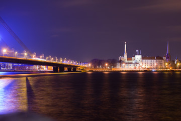 The Shroud Bridge (Latvian: VanÅ¡u tilts) in Riga is a cable-stayed bridge that crosses the Daugava river in Riga, the capital of Latvia.
