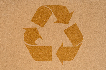 Recycling icon on empty cork noticeboard in office