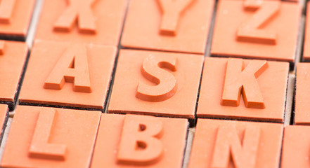 Close up of rubber stamp letters