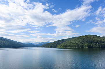 Naklejka na ściany i meble Photo of vidraru lake in fagaras mountains, Romania