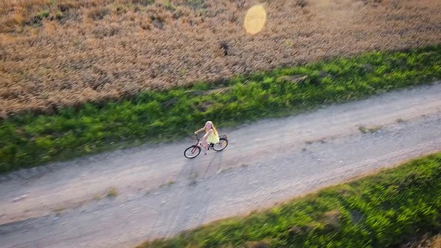 girl cycling. Aerial view