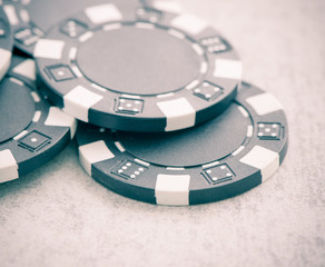 Casino chips pile for gambling and betting in poker. Symbol of luck, chance, winning money and entertainment.