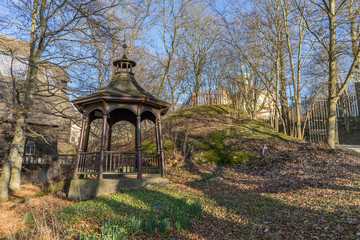 wooden arbour in a park
