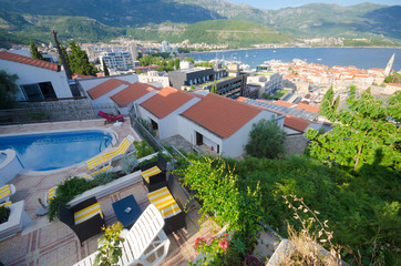 Hotel pool on the high point with airview on the city, adriatic bay and mountains. Budva,...