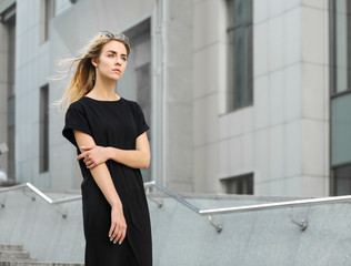 Beautiful stylish girl on street