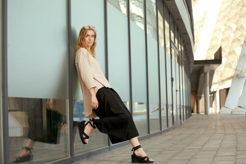 Beautiful stylish girl on street