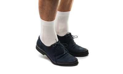 a man wearing shoes and socks