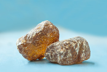 pieces of rosin closeup/ pieces of rosin closeup on blue background