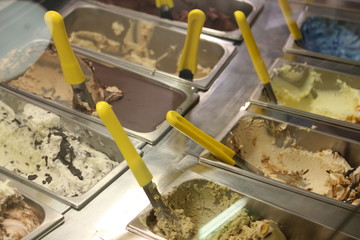 stainless steel tray with lots of fruit and cream ice cream