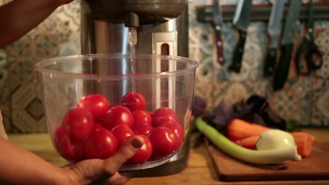Chef scalding tomatoes before cooking