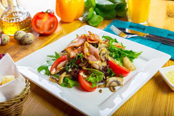 Warm mushroom salad with chilli and tomatoes