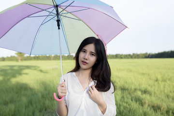 Young hipster girl with holding umbrella