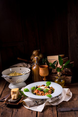 Ribbon Pasta with zucchini and olives in tomato sauce