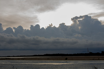 Black clouds with light of the sun.