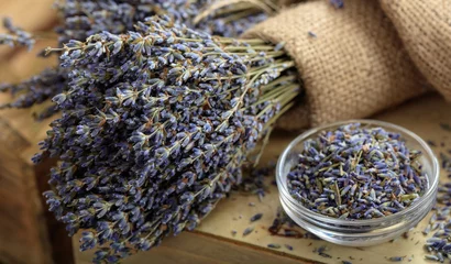 Foto op Aluminium Dried lavender bunch on a wooden table © Rawf8