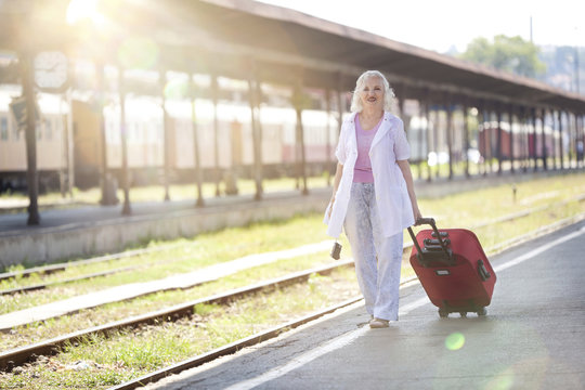 Journey Series: Senior Woman Traveling by Train
