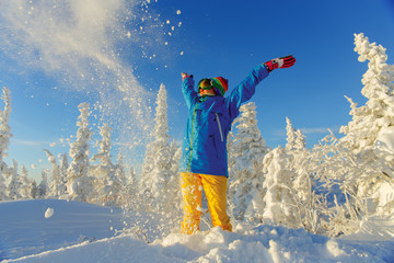 Woman snowboarder having fun.