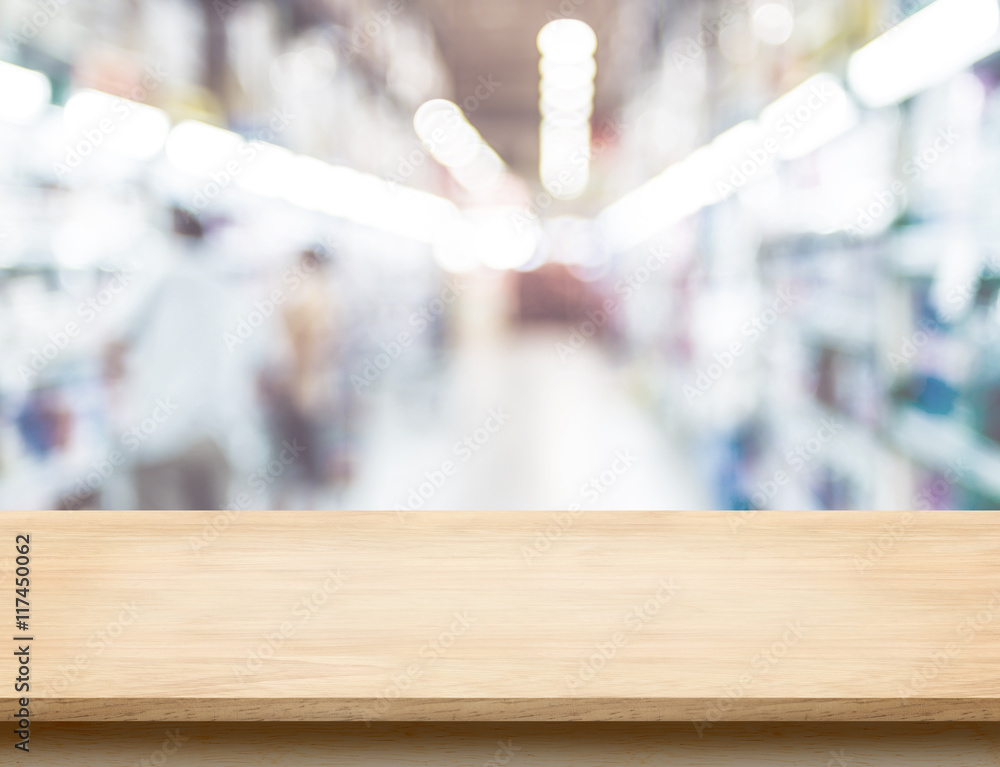 Poster empty wood table top with supermarket abstract blur background w