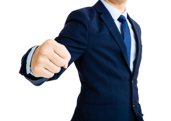 Businessman punching forwards