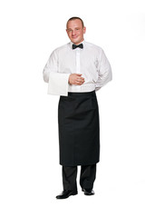 Man waiter standing aprone on isolation background. Smiling.