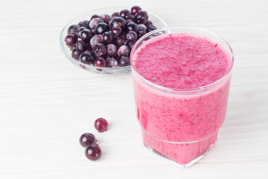Delicious smoothie with black currant on the table