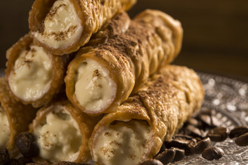 typical Sicilian pastries called CANNOLI with amarena listed in