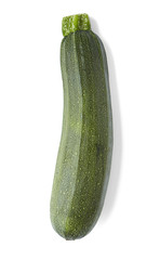 A single zucchini isolated on a white background
