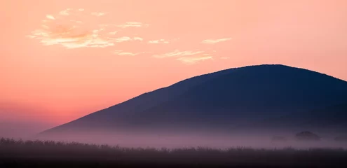 Tuinposter Beautiful landscape of distant hills on morning light © batke82as