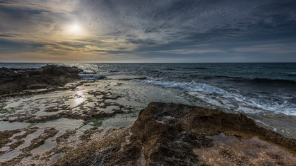 On the rocks... Photographed during amazing sunset at Mediterranean, Achzive shore, Israel, Mar 2016. 